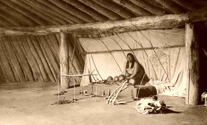 Arikara Indian at the alter, by Edward Curtis, 1908