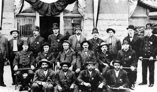 Muskogee Oklahoma Policemen with Bass Reeves in front row with cane.
