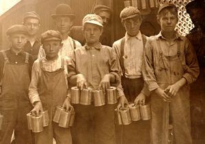 Boys working in a cannery in Indianapolis, Indiana, by Lewis Wickes Hine, 1908