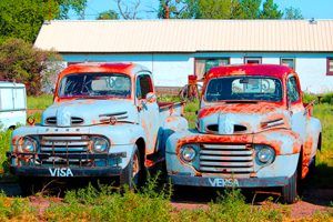 A couple of old trucks in Nara Visa, made a bit more colorful with a little enhancement
