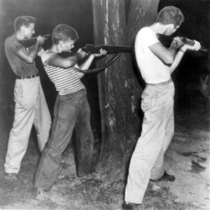 Servicemen firing at jail in Aspen, Tennessee, 1946. Servicemen firing at jail in Aspen, Tennessee, 1946.